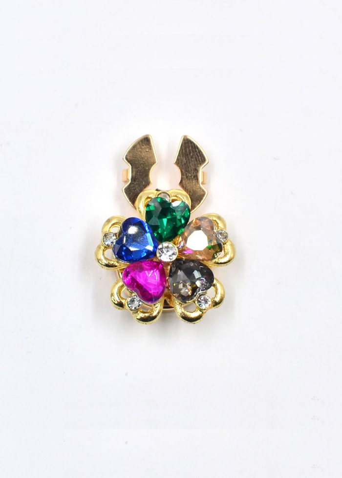 Multicolor flower shaped button cover on a white background
