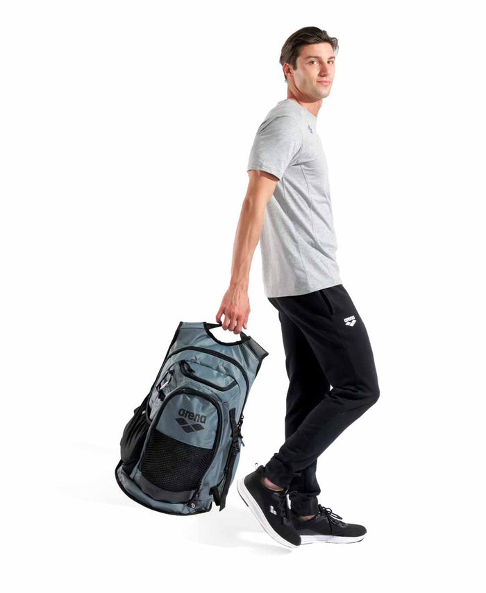 Arena All Set Backpack 45L in sage green, featuring multiple compartments and adjustable straps for versatile carrying.
