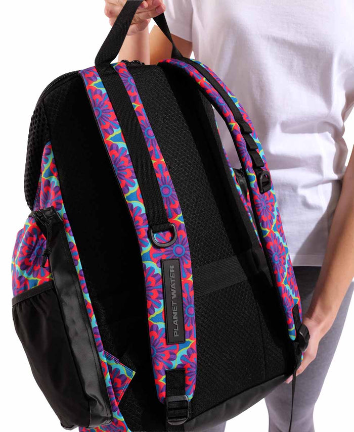 Arena One Go Allover Backpack 45L with floral pattern, durable fabric, adjustable straps, and multiple compartments.