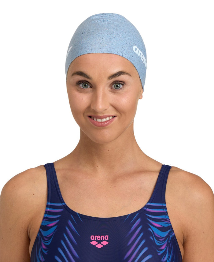Arena silicone swim cap for women, lightweight and snug fit, designed for comfortable swimming and water sports.