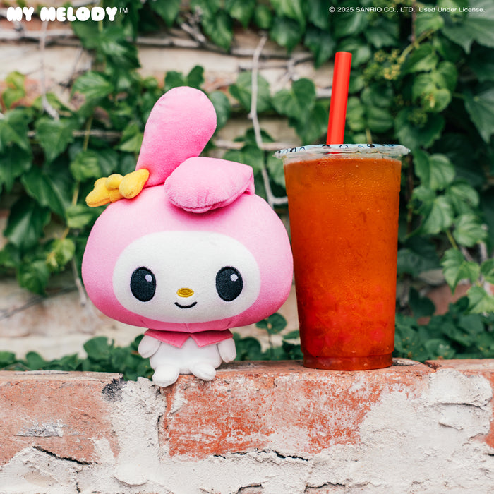 Cloudheads: 5" My Melody sitting on a wall with a cup of boba