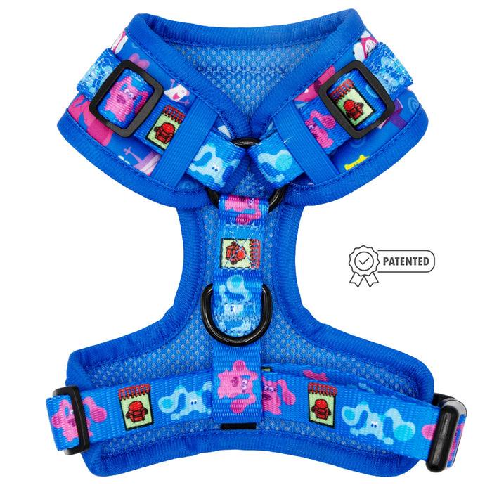 The Sassy Woof Dog Adjustable Harness - Blue's Clues™ features adjustable straps, mesh padding, a vibrant elephant and red pagoda print, a front black D-ring, and a patented badge on the right side.
