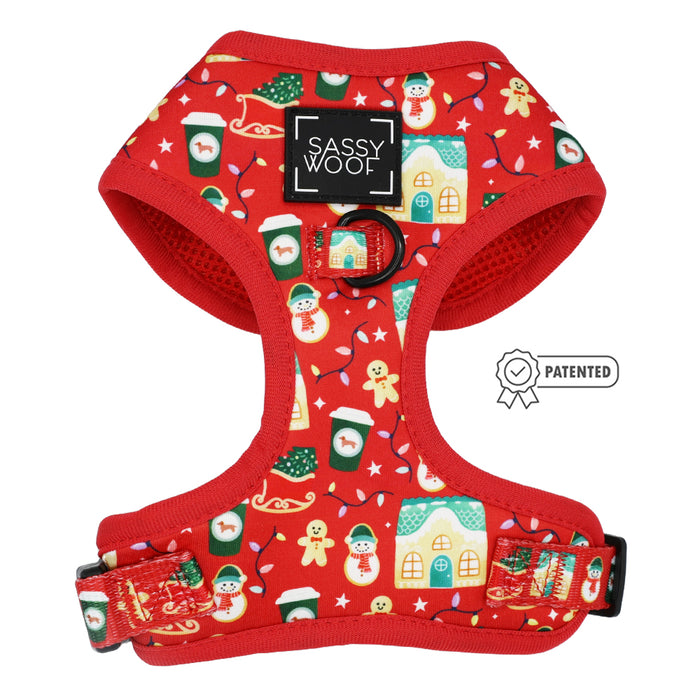 The Sassy Woof Dog Adjustable Harness – Sleigh Baby Sleigh features festive holiday designs like snowmen and gingerbread men, a black leash ring, Patented badge, and Sassy Woof label—perfect for Christmas outings with your pet.