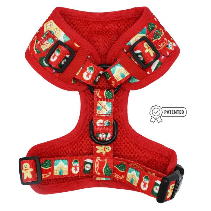 The Sassy Woof Dog Adjustable Harness - Sleigh Baby Sleigh features festive prints like gingerbread men, stockings, trees, and Santa faces, black buckles, and a patented badge—part of our Christmas pet accessories collection.