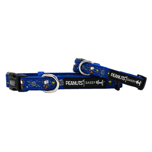 Two blue adjustable Sassy Woof Dog Collars - Peanuts™ Snoopy in Space with metal rings, black buckles, and Peanuts branding—perfect dog accessories for any Snoopy fan.