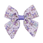 A lavender Dog Sailor Bow - Kuromi™ from Sassy Woof, adorned with cute animal characters and tiny star and flower motifs, plus a solid purple center knot—perfect to pair with any stylish dog collar.
