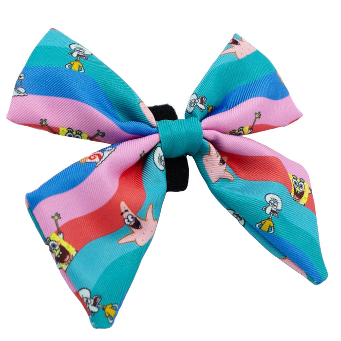 Brighten your pup's style with the Sassy Woof Dog Sailor Bow - SpongeBob SquarePants™ and Friends, featuring SpongeBob, Patrick, and Squidward on striped fabric. Mix and match with other SpongeBob pet accessories for a complete Bikini Bottom look!.