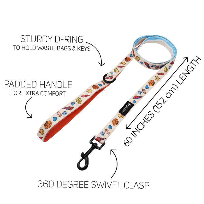 The Sassy Woof Dog Two Piece Bundle - Shell Yeah features a patterned leash with padded handle, sturdy D-ring, and 360° swivel clasp. Labels with text and arrows highlight product features—ideal to pair with your favorite dog harness or beach gear.