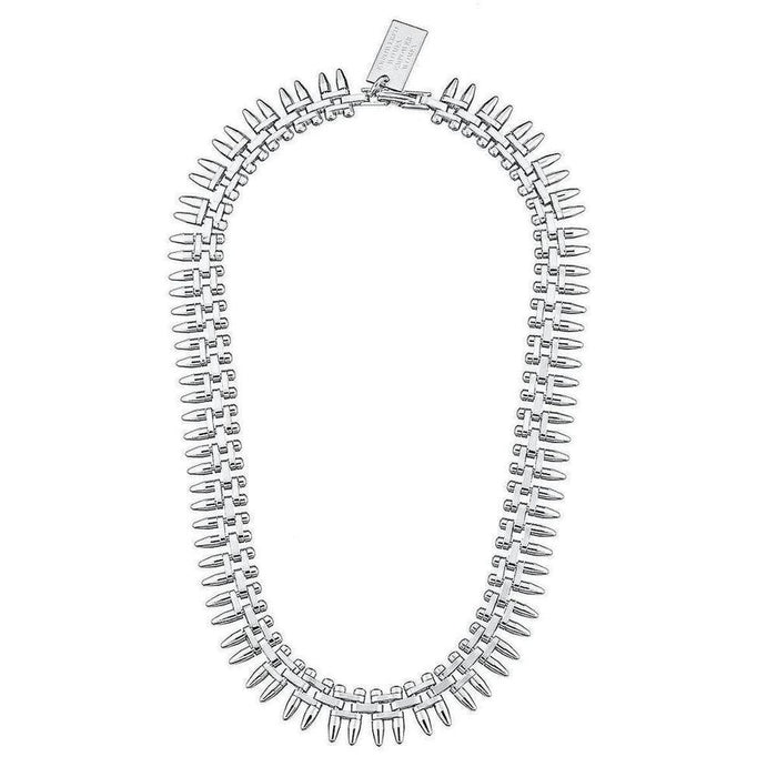 Silver bullet-shaped necklace, modern design, on white background.