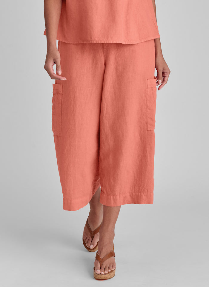 Full Time Pant, shown in Mango, size Small.  Model is 5'9" tall.  100% Linen with Cotton Knit drawstring waistband and trim on the cargo-style pockets.