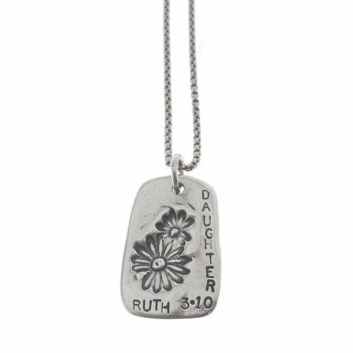 Silver necklace featuring a rectangular pendant with floral etching and "Daughter Ruth 3:10" inscription.