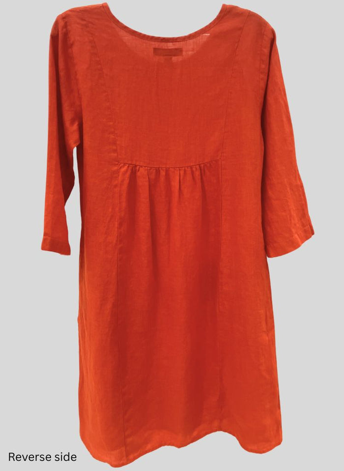 Happy Gather's Dress, shown in Koi, on the reverse side.  Featuring vertical seams and gathered detail.