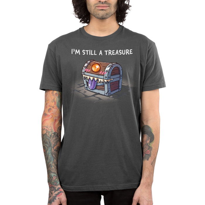 Premium Cotton T-shirt_TeeTurtle charcoal gray I'm Still a Treasure apparel featuring a mimic happily smiling with its tongue out.