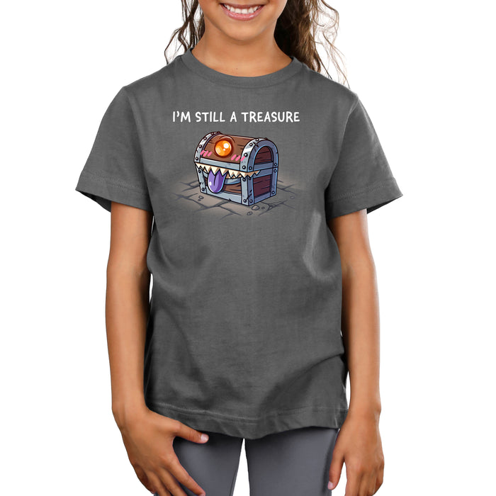 Premium Cotton T-shirt_TeeTurtle charcoal gray I'm Still a Treasure apparel featuring a mimic happily smiling with its tongue out.