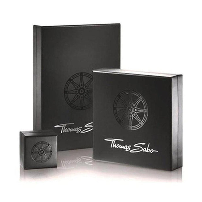 Black jewelry boxes of varying sizes, featuring embossed wheel designs and subtle silver lettering.