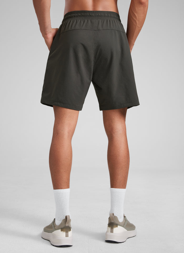 CRZ YOGA Men‘s Workout Water Resistant Short 7" with Zip Pockets Arbor Olive