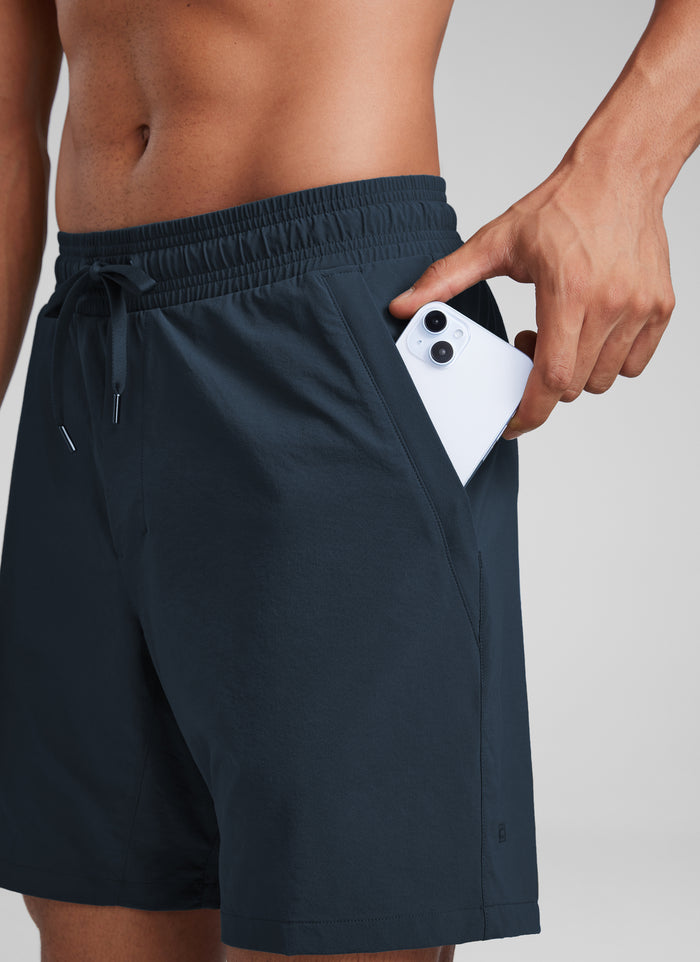 CRZ YOGA Men‘s Workout Water Resistant Short 7" with Zip Pockets True Navy