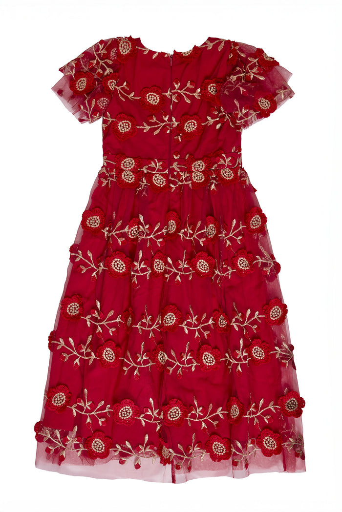 The back of a Red dress embroidered with gold floral details against a white background
