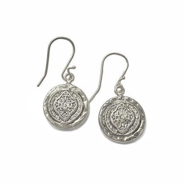 Silver drop earrings with textured coin-shaped charms featuring ornate detailing.
