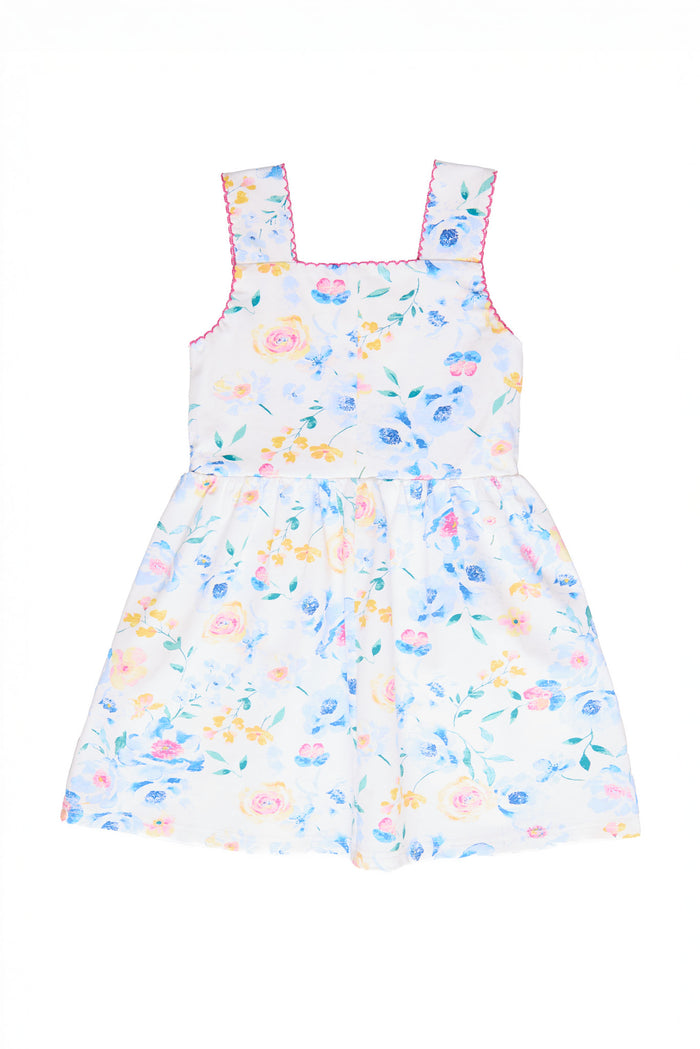 The Ivy City Co Mini Rue Play Dress in Blue Bouquet is a sleeveless, knee-length floral dress with a square neckline, wide straps, and pink lace trim, featuring a pastel blue bouquet print on white.