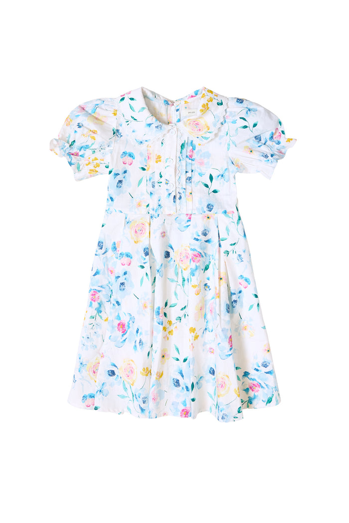 The front of a blue floral dress against a white background
