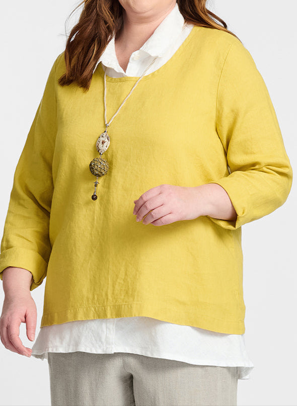 Pure Top (shown in Goldenrod), layered over the Skyline Blouse (White).  Model is 5'9" tall, wearing size Medium.