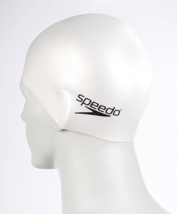 White Speedo flat silicone swimming cap for women, designed to reduce drag and protect hair during swim sessions.