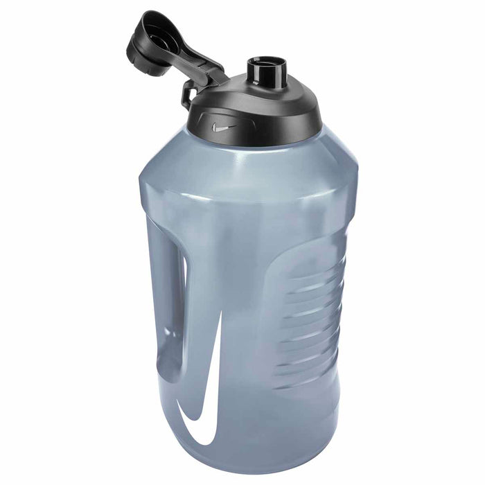 Nike Super Jug 128oz water bottle in anthracite, black, and white with a durable design and large capacity for hydration.