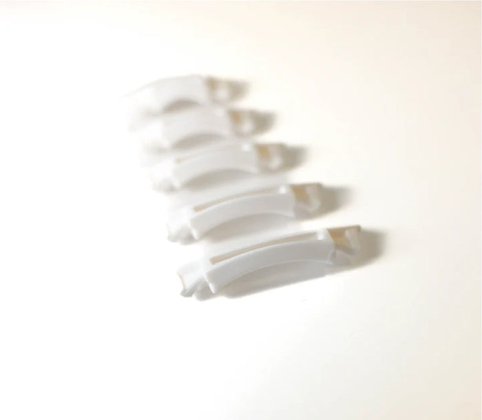 Swans Valkyrie nose piece set in white for goggles, featuring replacement nose bridge and padding for comfortable fit.