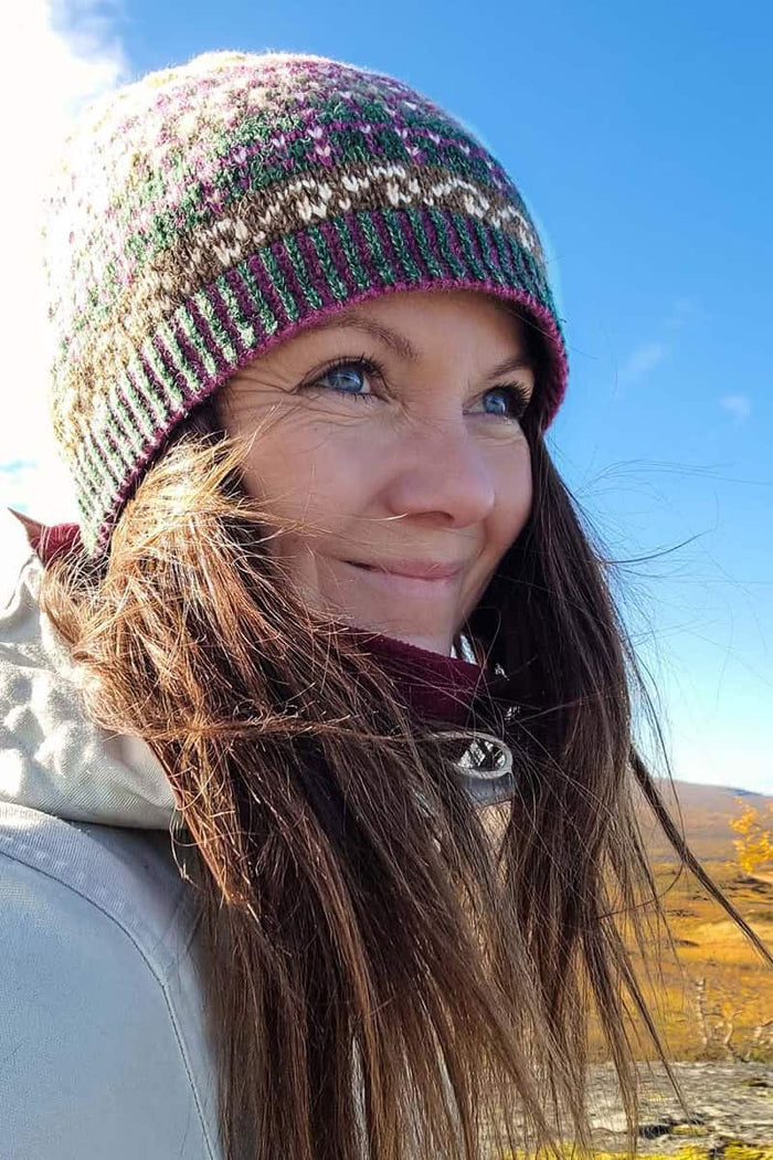 Swimzi Burra Fern beanie hat in multicolor, cozy knit cap for cold weather, featuring fern pattern and branded logo.