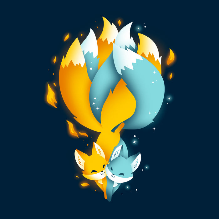 Classic Cotton T-shirt_TeeTurtle Tails of Fire and Ice navy blue apparel featuring an orange and blue kitsune with their tails interlocked with flames and ice sparkles surrounding them.