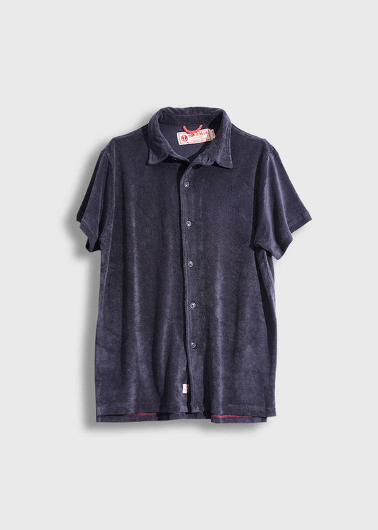 Dark blue short-sleeve button-up shirt with a collar, displayed on a light background, featuring a visible red label inside.