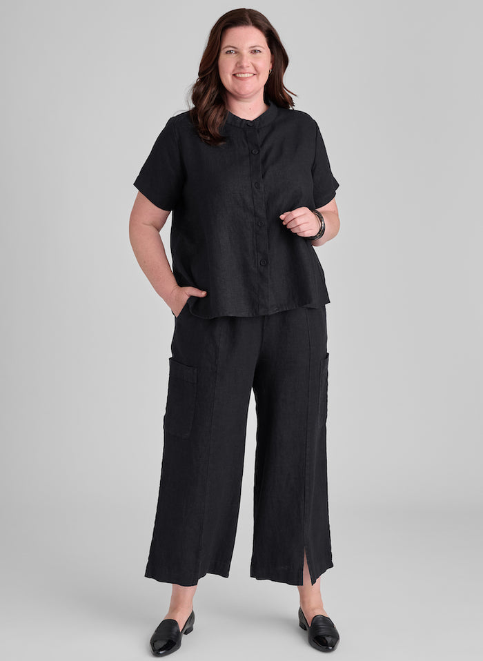 Zdenka Blouse is paired with the Modern Floods, both shown in Black.  Model is 5'9" tall, wearing size Medium.  100% Medium-weight European Linen.